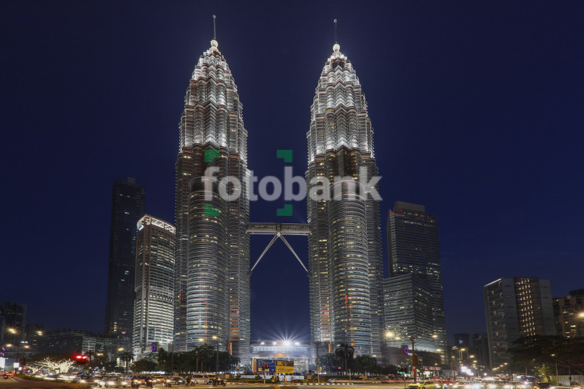 Petronas Twin Towers Kaula Lumpur in the Evening Shinning with Lights