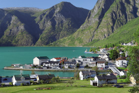 Norway Huge Green  Mountains with Lake and Houses