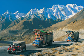 Pakistani Trucks Travelling on the Dangerous Raods of Mountains Covered with Snow